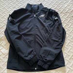 Women’s black Nike zip front Philadelphia Eagles NFL jacket windbreaker XS new